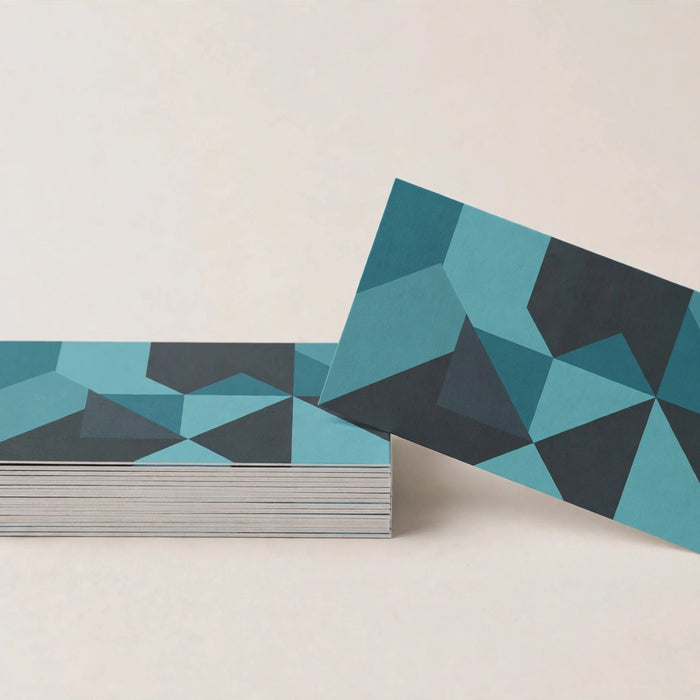 Stack of printed business cards with colorful generic designs